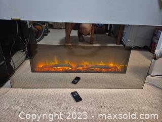 MaxSold Auction: Wall-Mount Electric  heating Fireplace, Linear Glass Front, 36 in,  multi color option  - Kingston (Ontario, Canada) SELLER MANAGED Downsizing Online Auction - Canniff Place