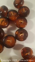 MaxSold Auction: 18 Bakelite Vintage Buttons Amber Style 2 Sizes - Toronto (Ontario, Canada) SELLER MANAGED Downsizing Online Auction - Junction Road 