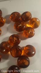 MaxSold Auction: 23 Bakelite Vintage Amber Coloured Buttons - Toronto (Ontario, Canada) SELLER MANAGED Downsizing Online Auction - Junction Road 