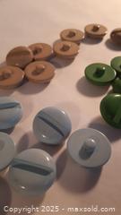 MaxSold Auction: 23 Coat Buttons Light Blue Mint Green Grey 22 x 6mm - Toronto (Ontario, Canada) SELLER MANAGED Downsizing Online Auction - Junction Road 