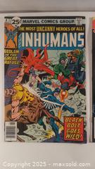 MaxSold Auction: 2 Comics DC Crisis Flash Marvel Inhumans - Toronto (Ontario, Canada) SELLER MANAGED Downsizing Online Auction - Junction Road 