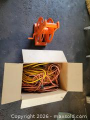 MaxSold Auction: Orange/Yellow Hose & Cable Reel with Multiple Extension Cords - Ottawa (Ontario, Canada) PARTNER MANAGED Estate Online Auction - Thorncliff Place