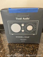 MaxSold Auction: Tivoli Audio Model One Table Radio AM/FM - Graphite - Bowmanville (Ontario, Canada) SELLER MANAGED Downsizing Online Auction - Longworth Avenue