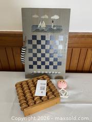 MaxSold Auction: Footroller, Nautical checkers, and vintage rattle - Perth (Ontario, Canada) SELLER MANAGED Estate Sale Online Auction - Code Road