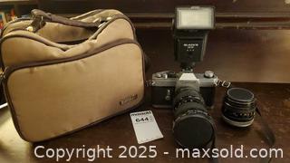 MaxSold Auction: Canon TX 35mm SLR with FD 50mm &#38; 35-105mm Lenses A - Ottawa (Ontario, Canada) PARTNER MANAGED Downsizing Online Auction - Garfield Avenue