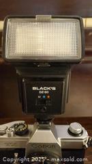 MaxSold Auction: Canon TX 35mm SLR with FD 50mm &#38; 35-105mm Lenses A - Ottawa (Ontario, Canada) PARTNER MANAGED Downsizing Online Auction - Garfield Avenue