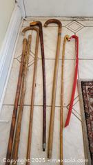 MaxSold Auction: Lot of 7 Walking Canes — 6 Wooden &#38; 1 Red shoe horn A - Ottawa (Ontario, Canada) PARTNER MANAGED Downsizing Online Auction - Garfield Avenue