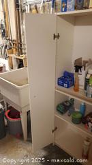 MaxSold Auction: White Laminate Freestanding Storage Cabinet / Utility Pantry C - Ottawa (Ontario, Canada) PARTNER MANAGED Downsizing Online Auction - Garfield Avenue