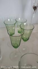 MaxSold Auction: Mixed glassware lot with Pitcher, Flutes, and Tumblers B - Ottawa (Ontario, Canada) PARTNER MANAGED Downsizing Online Auction - Garfield Avenue