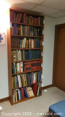 MaxSold Auction: Tall Wood-Veneer Bookshelf C - Ottawa (Ontario, Canada) PARTNER MANAGED Downsizing Online Auction - Garfield Avenue